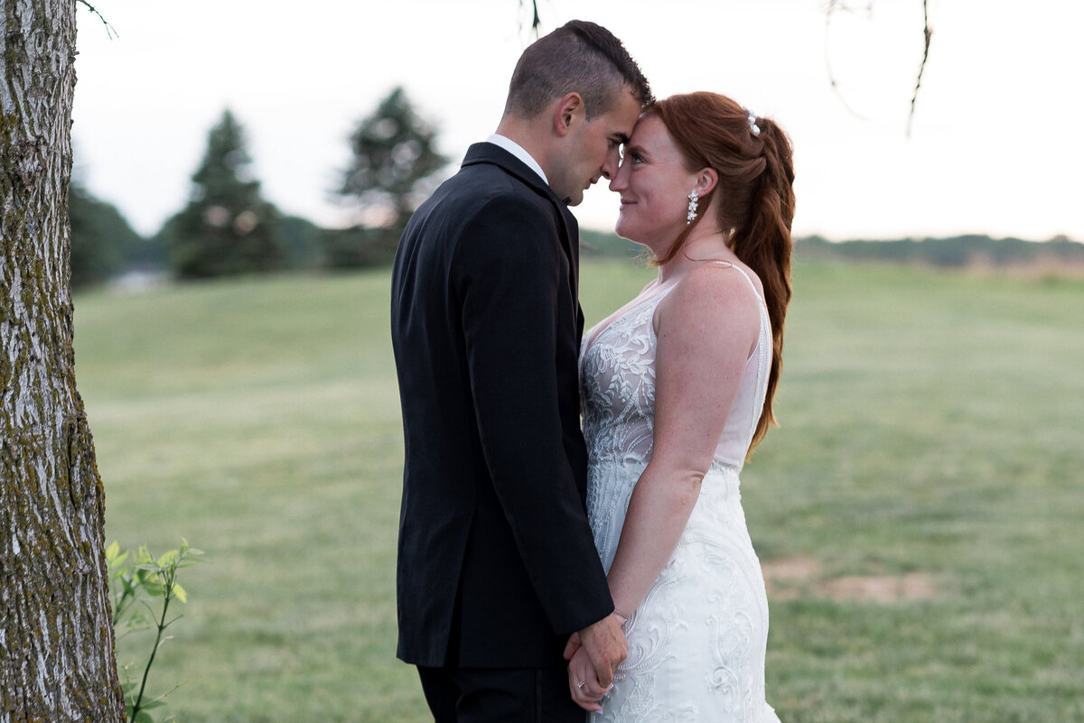 Couple candid outdoor embrace
