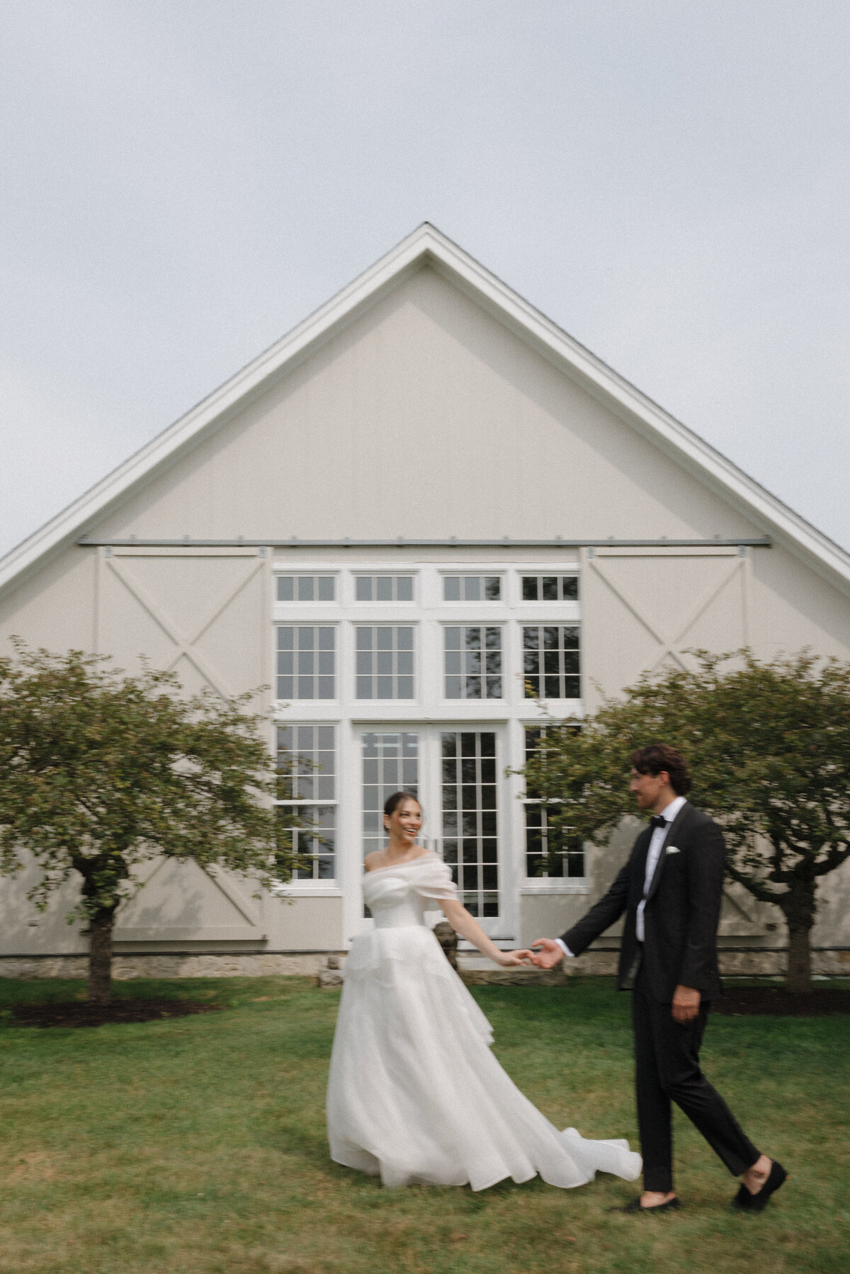 Elegant editorial wedding portrait demonstrating sophisticated photography at Lion Rock Farm destination venue. NYC photographer Lauren Alatriste combines fashion photography techniques with authentic emotion, creating luxury wedding imagery that feels both editorial and genuine.