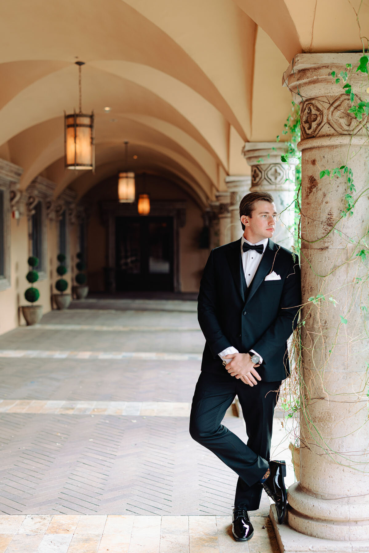 Groom portraits in Villa Siena courtyard Phoenix Arizona wedding photography