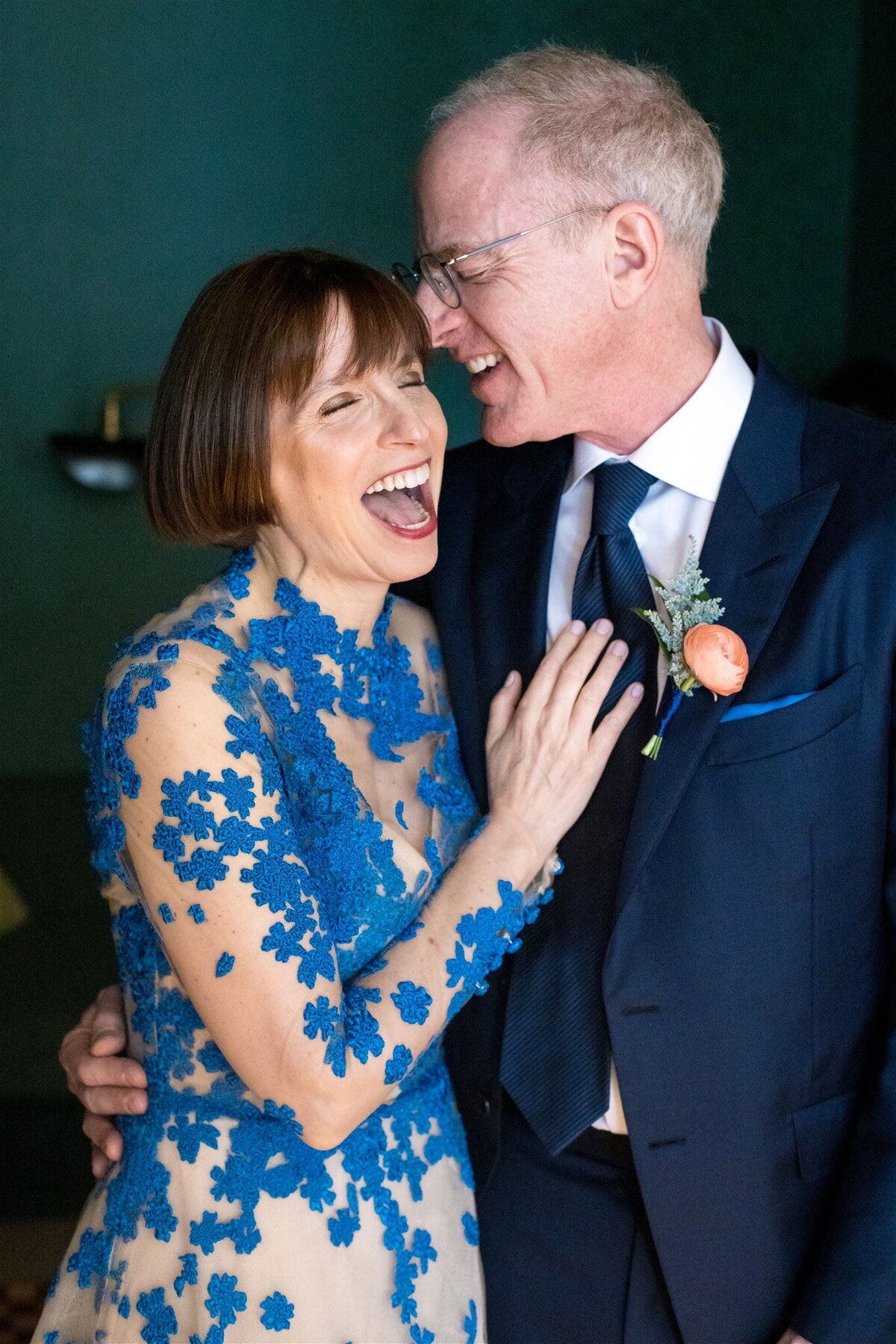 Bride and groom share a laugh