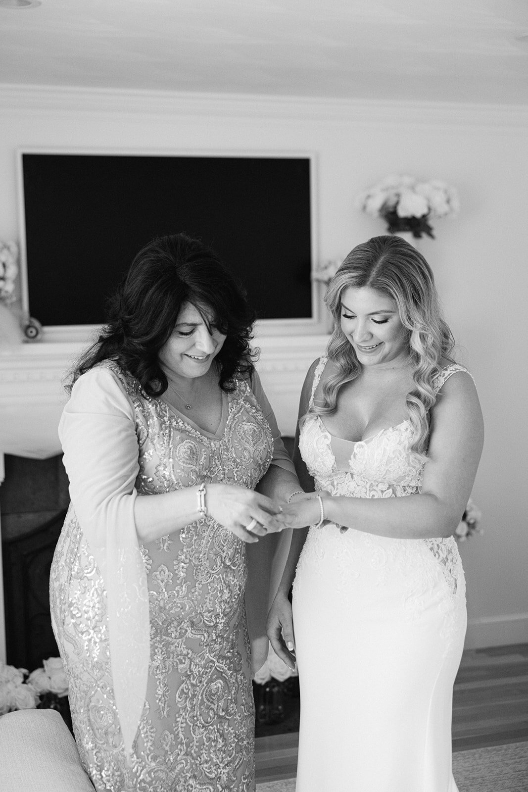 a bride enjoying time with a bridesmaid