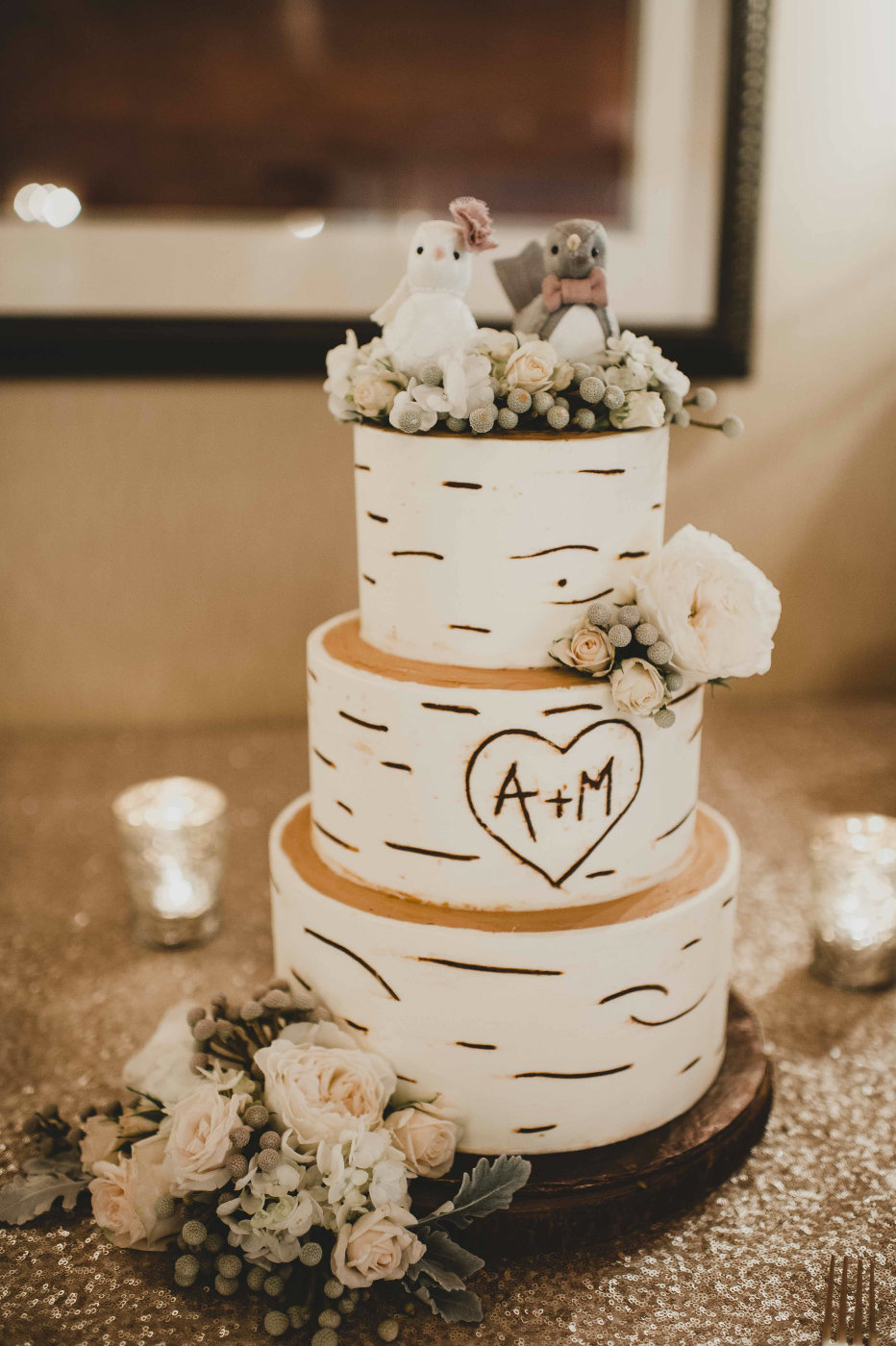 rustic white winter wedding cake with fresh flowers