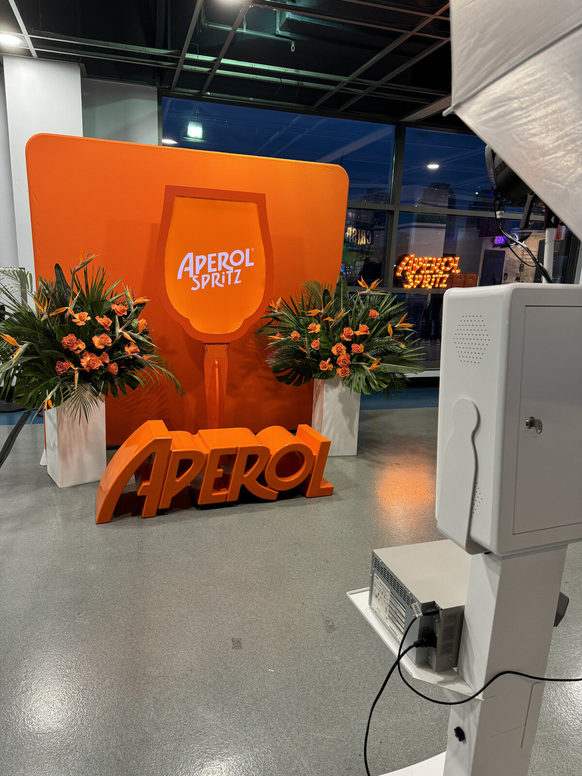 Photo booth set up for aperol spritz marketing event