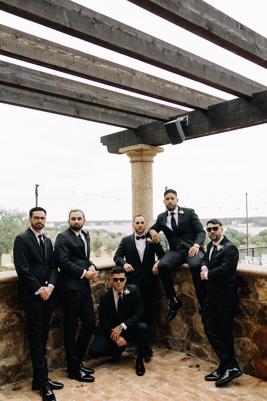 groomsmen posing at bella collina orlando wedding​
