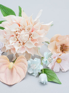 sugar flowers for pastel spring wedding cakes featuring dahlias anthurium lily delphinum cosmos and ranunculus - sugar flowers by kelsie cakes