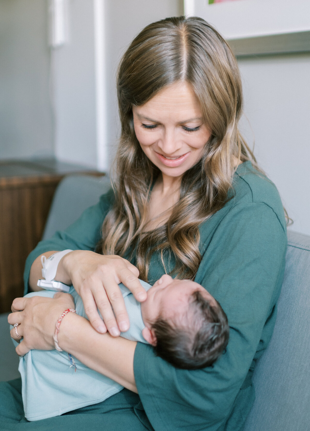 mom holding newborn in the hospital american fork