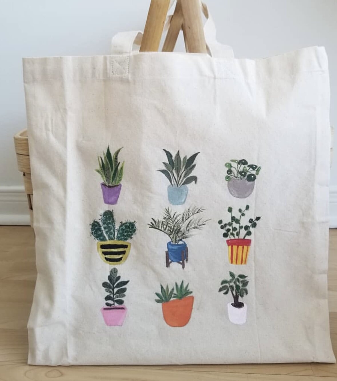 Custom floral and plant illustrations on hand-painted tote bag by Toronto artist Jenny Zhang