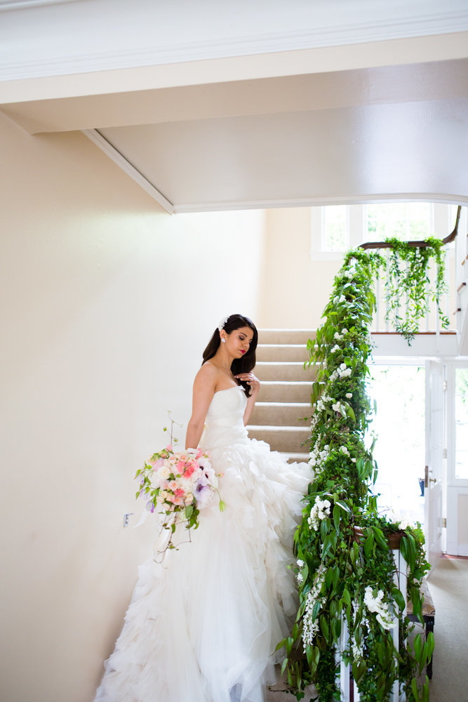 Romantic garden wedding luxe staircase floral instillation at Admirals House Seattle.