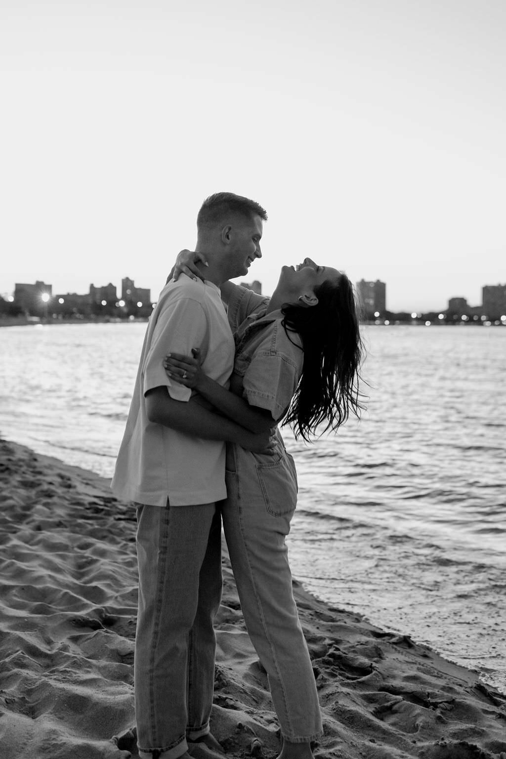 An engagement photography session at The Wrigley Building and North Ave Beach in Chicago, Illinois - 34