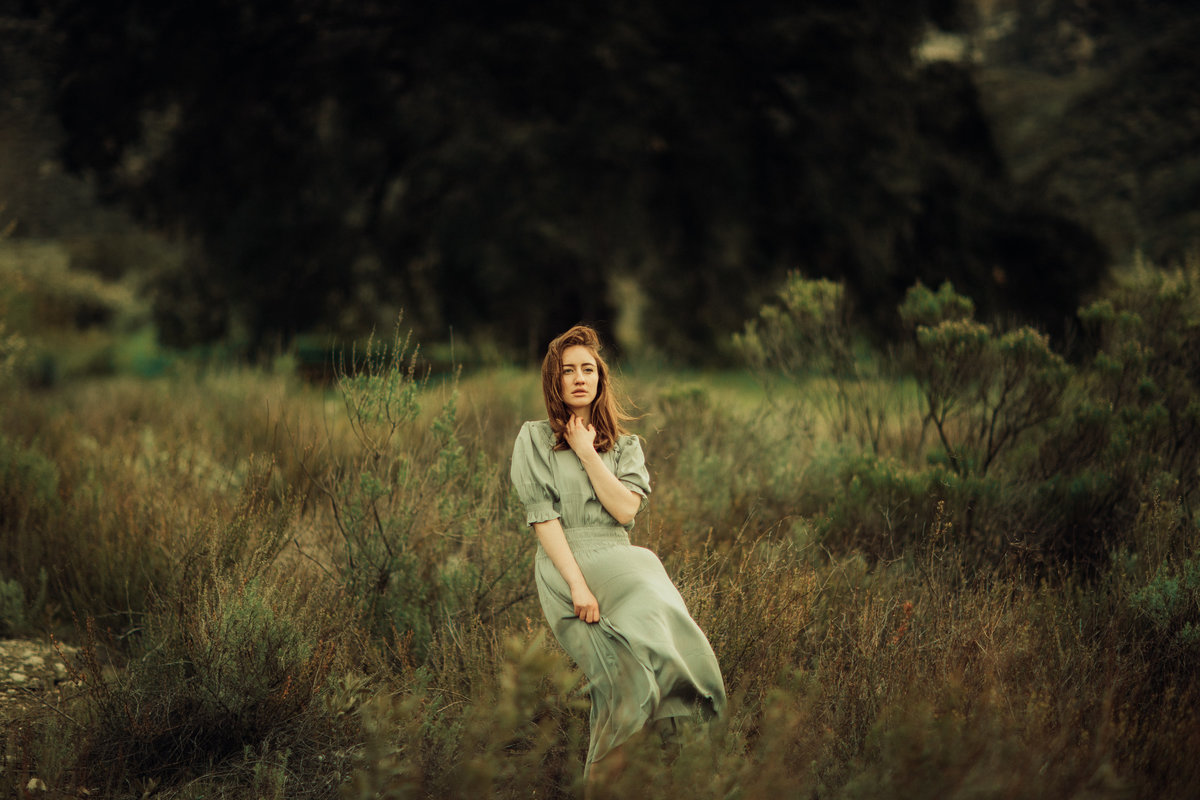 Portrait Photo Of Young Woman In The Middle Of a Meadow Los Angeles