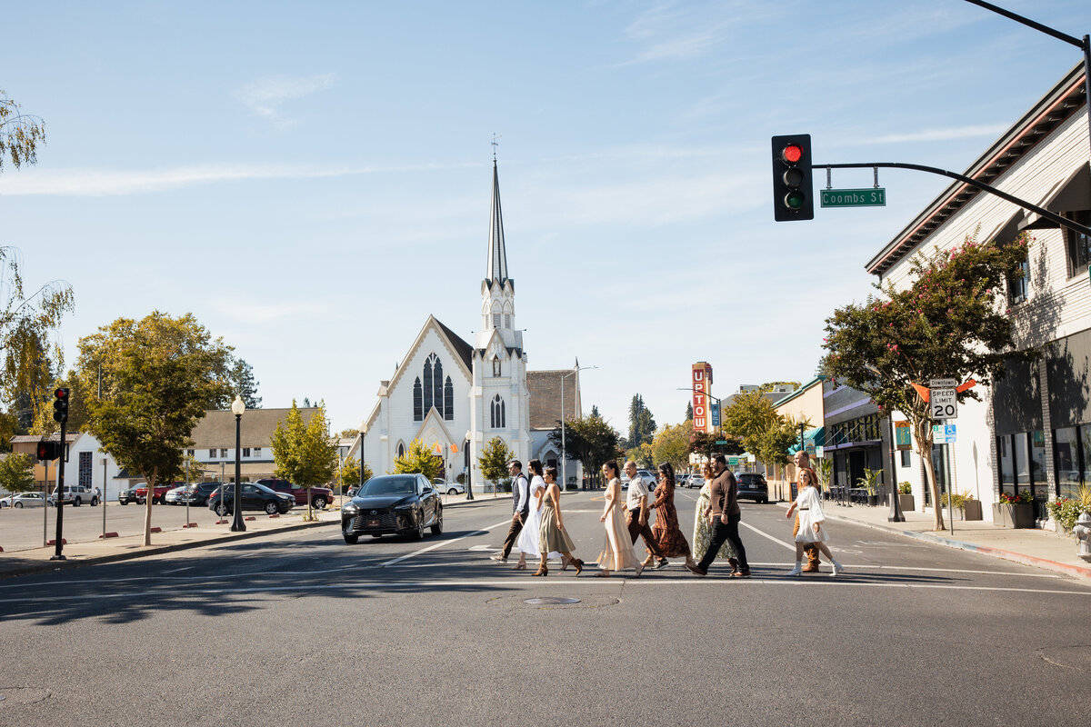 A familt walks across the street in downtown napa california - captured by a bay area photographer