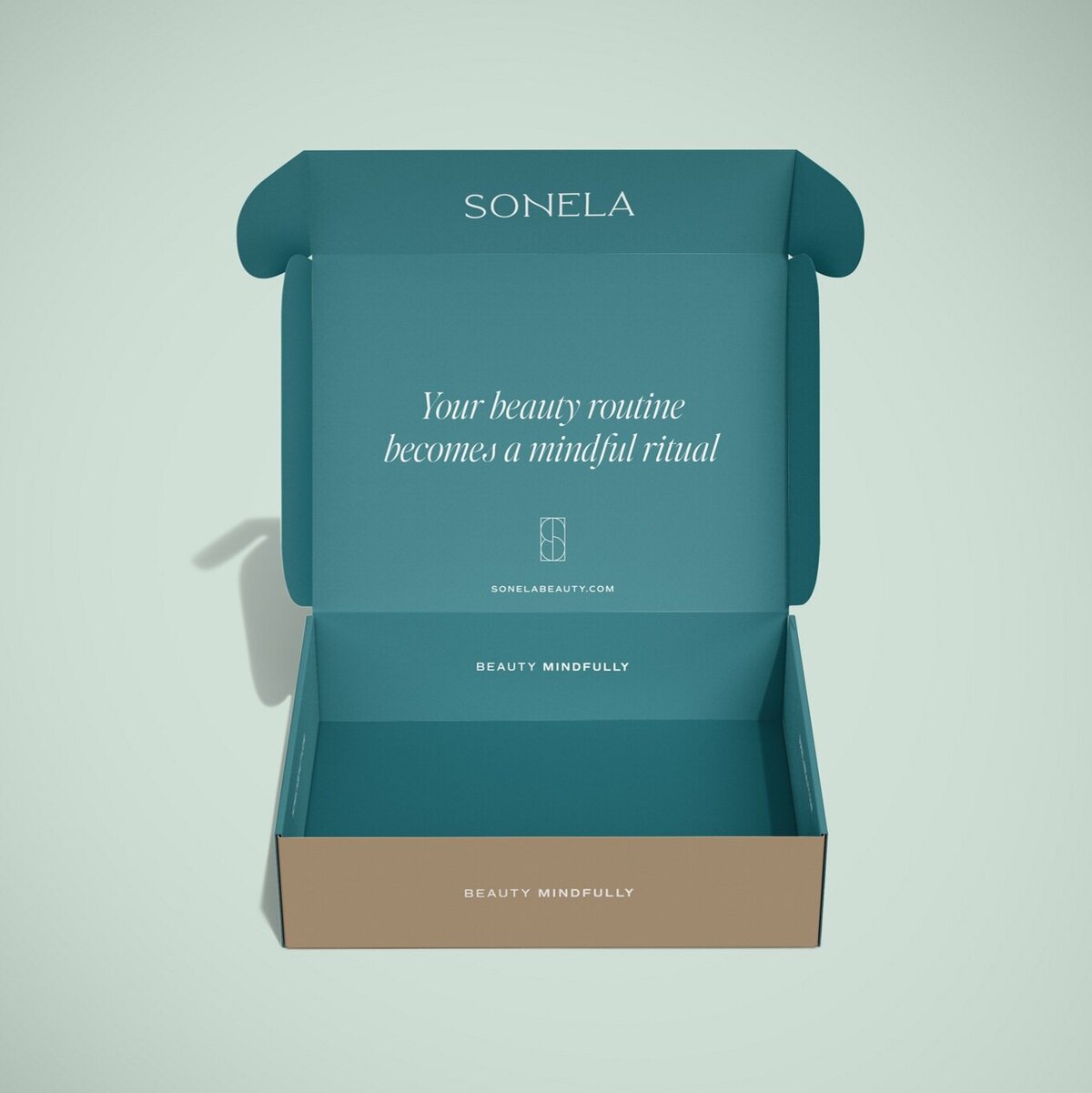 Teal and mint mailer box mockup for Sonela Beauty’s clean cosmetics range