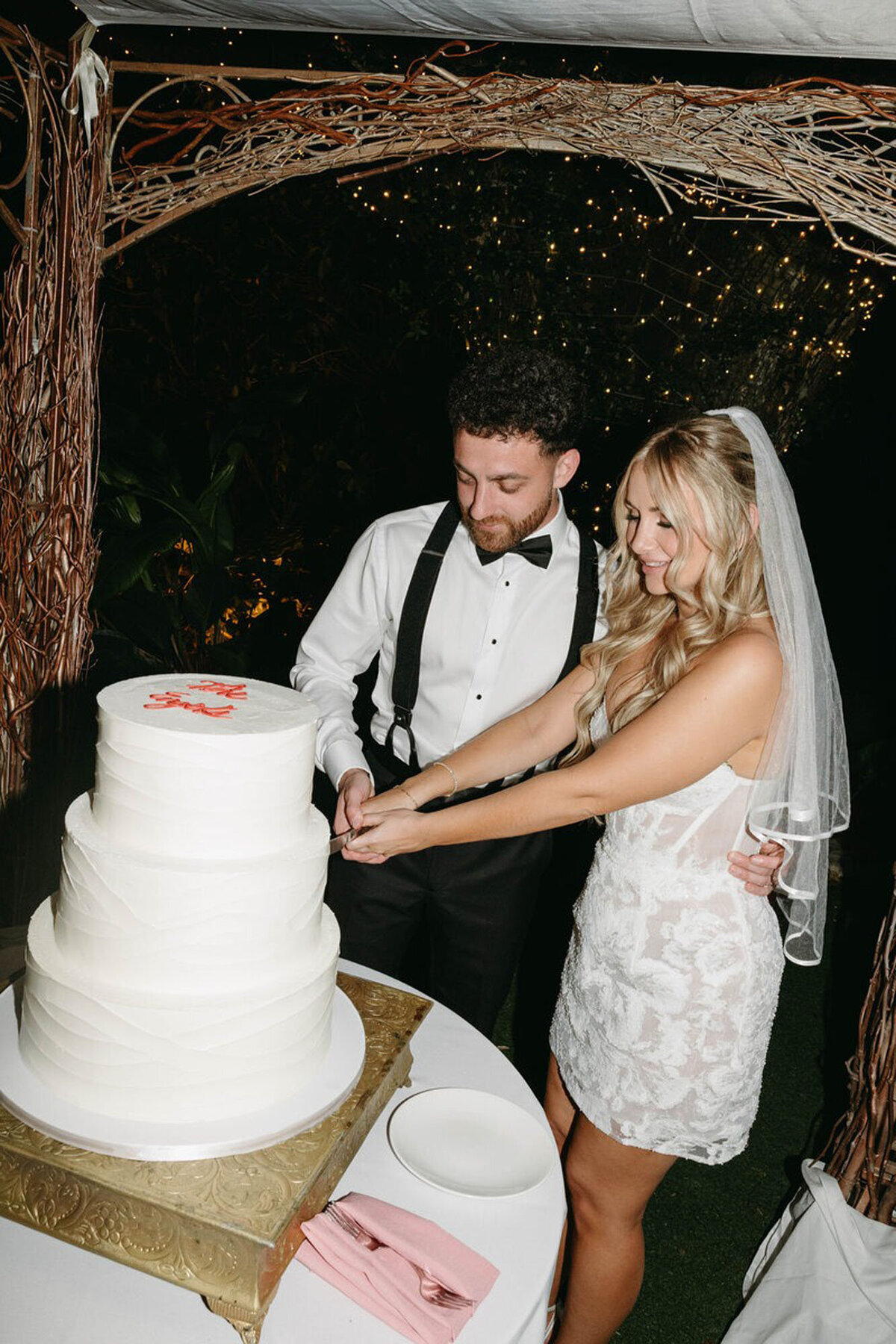Cake cutting at wedding, by one of the photographers in orlando