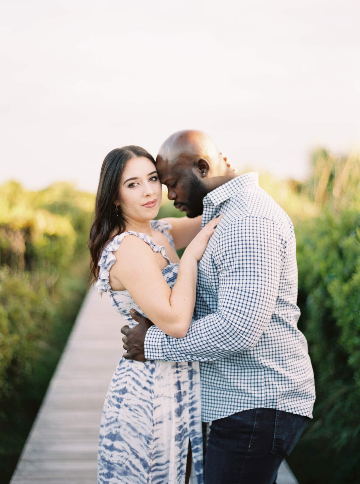 Stunning image of interracial couple during engagement photos at Seabrook Island in Charleston, South Carolina by Danielle Defayette