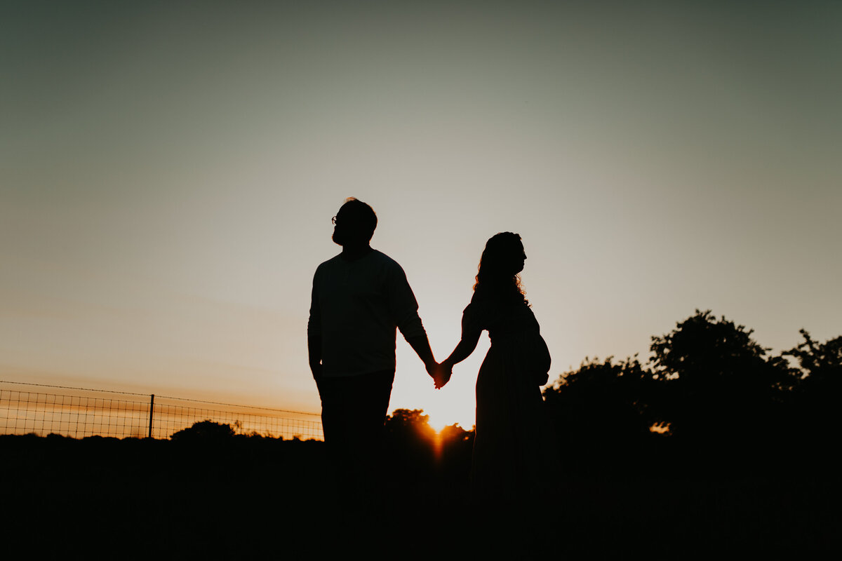 First time parents posed for maternity session with Cameron Fox of Foxc Photography on private land in Blum, Texas.