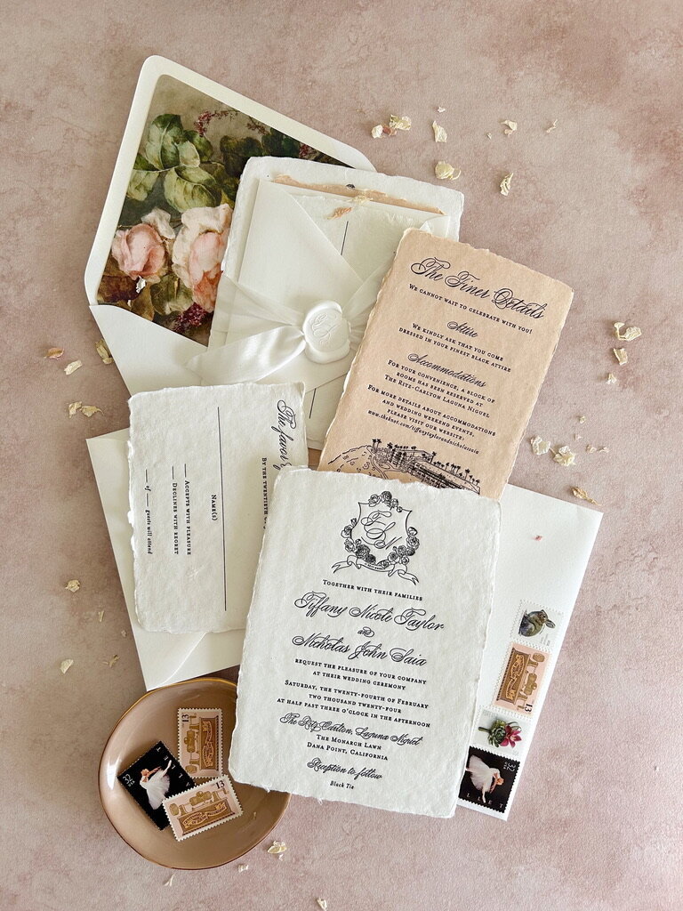 Romantic invitation suite with vintage envelope liner, letterpress printing, and hand illustrations by Lindsey Ellen Paper Co. for  a wedding at the Ritz Carlton Laguna Niguel