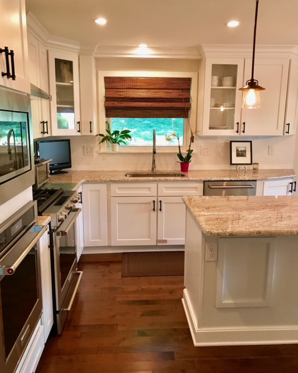 Stainless steel Refrigerator  Open kitchen lights of light clean reno construction Philadelphia Mainline Pa Chestnut hill Jersey Shore Avalon Stone harbor 