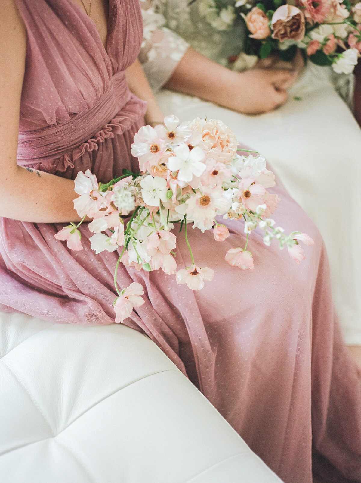 pink bridesmaids dress with organic wedding flowers