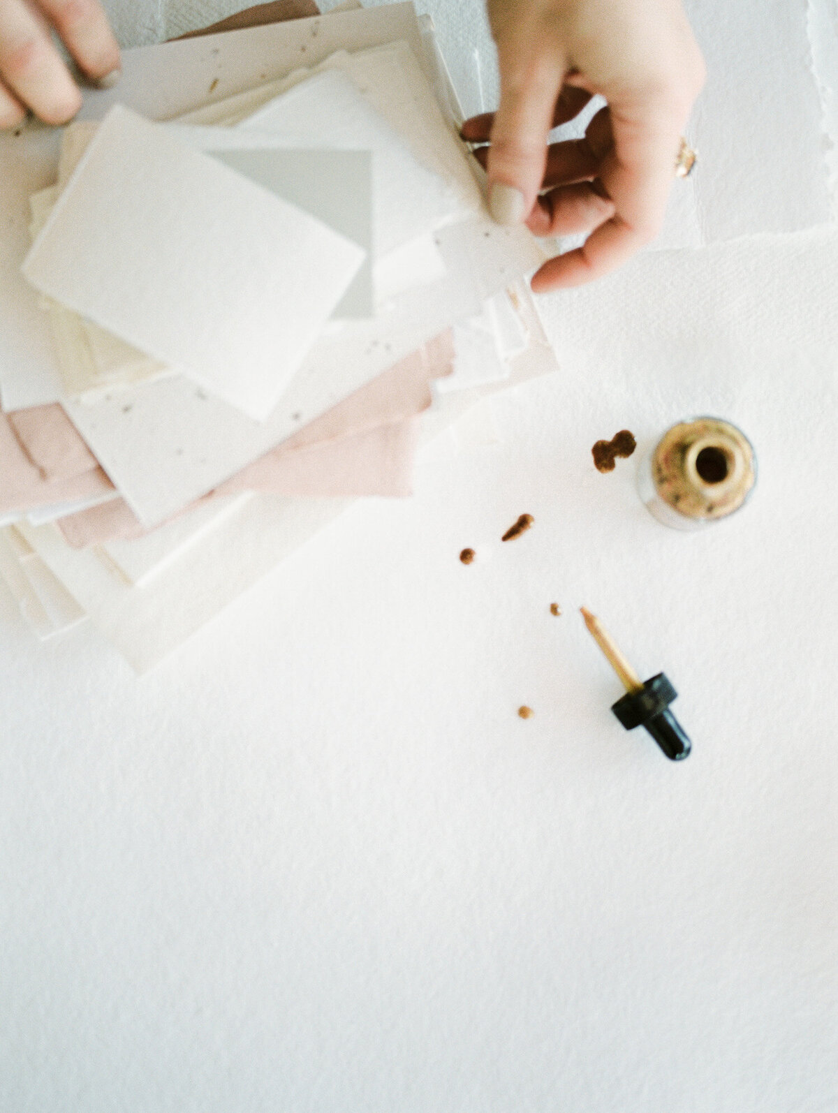 calligraphy materials, gold ink, dropper, handmade paper, brand photoshoot