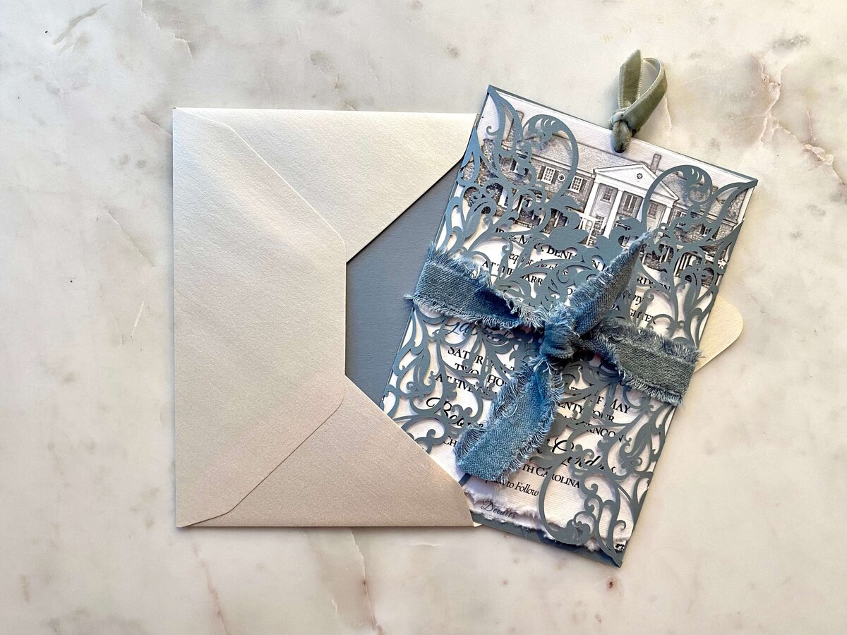 dusty-blue-lasercut-gatefold-velvet-ribbon