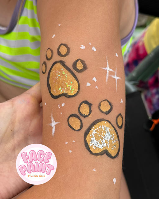 face-painting-by-alyssa-daken-cute-gold-glitter-sparkles-paw-print-arm-design