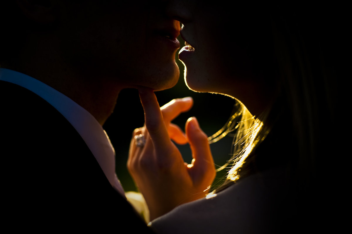 wedding couple close up whisper love kiss - charleston wedding photographers - King and Fields Studios