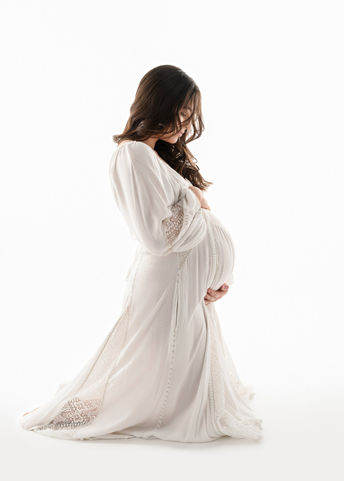 Backlit photos, photographer Syracuse, pregnancy photo shoot, mother to be, baby pics, pregnancy gowns, pregnancy photos, photography, baby belly, backdrop, studio, white, photographs
