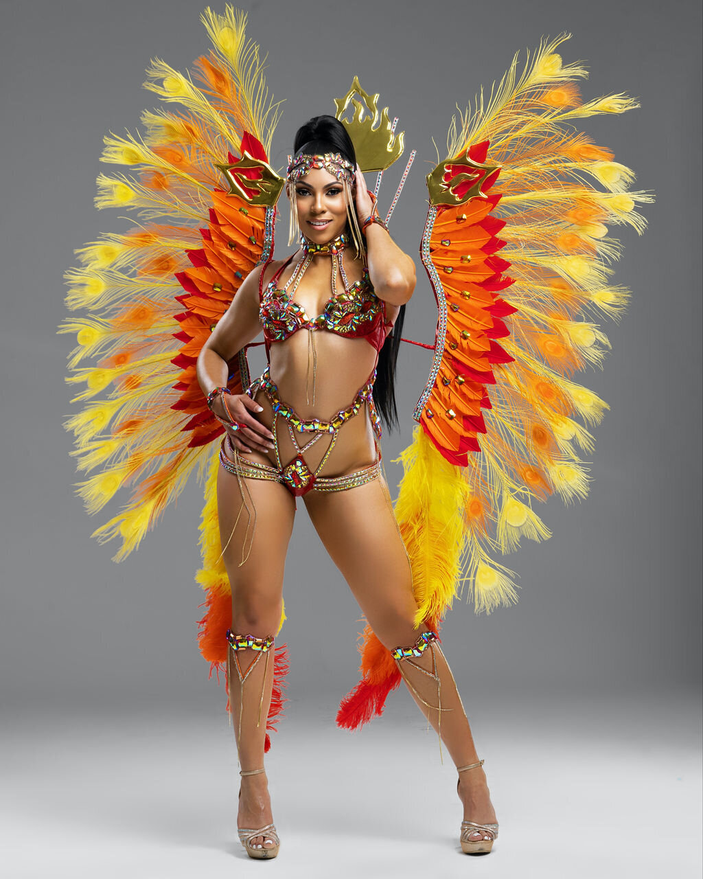 Red and Yellow costume for Caribana Toronto. Register to play mas with Sunlime Mas