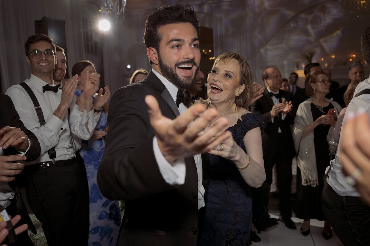 Guests enjoy the dance floor during wedding at Belle Mer Newport.