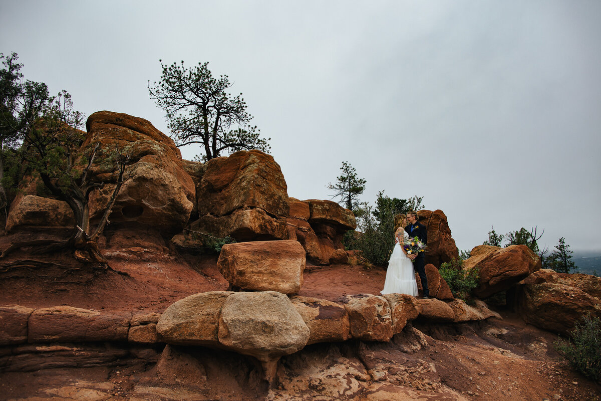 Bride and Groom standing in Mountains Colorado Wedding