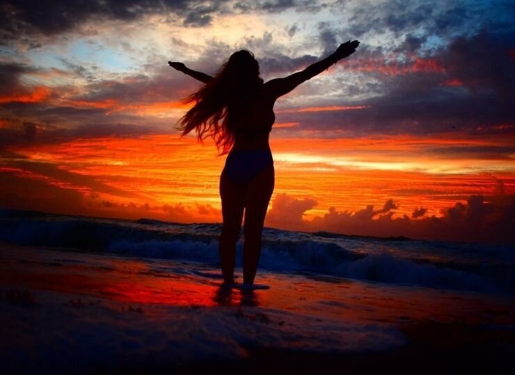 beautiful-women-beach-sunrise-florida-yoga-orange-blue-sky