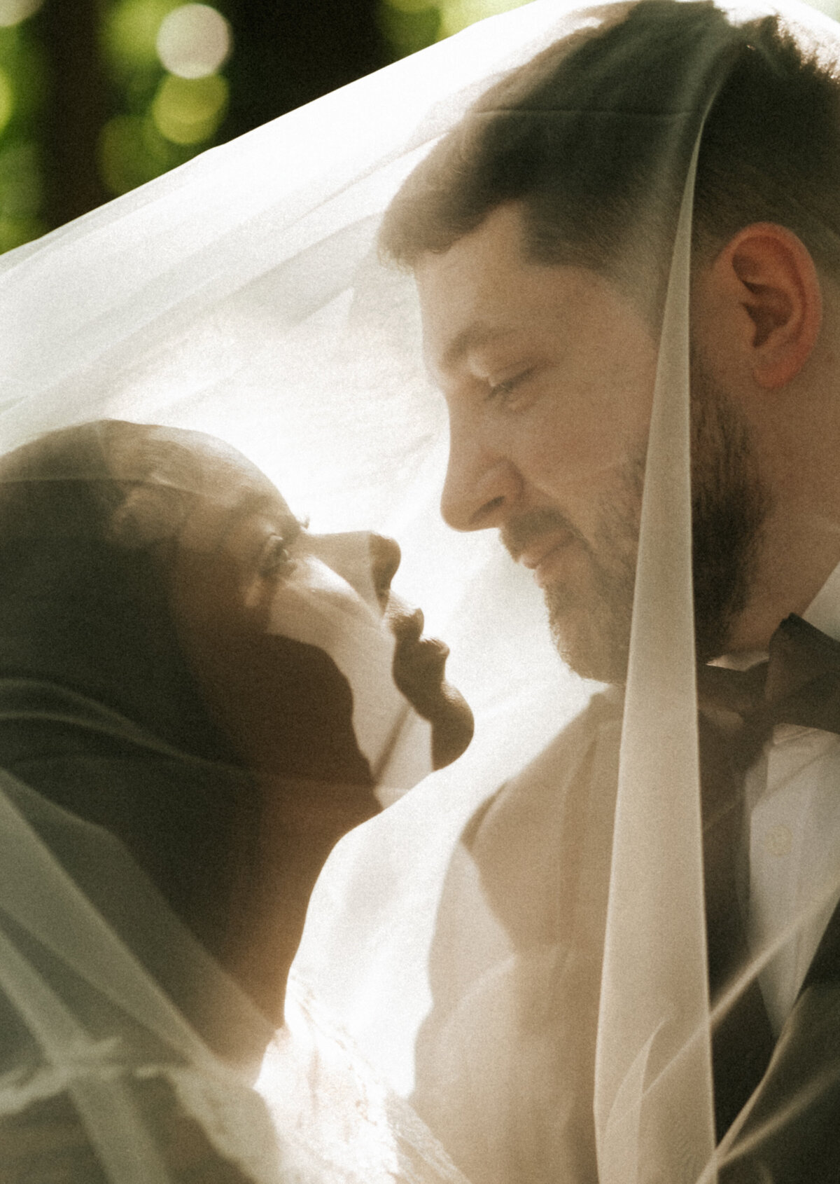 newly weds hiding under veil