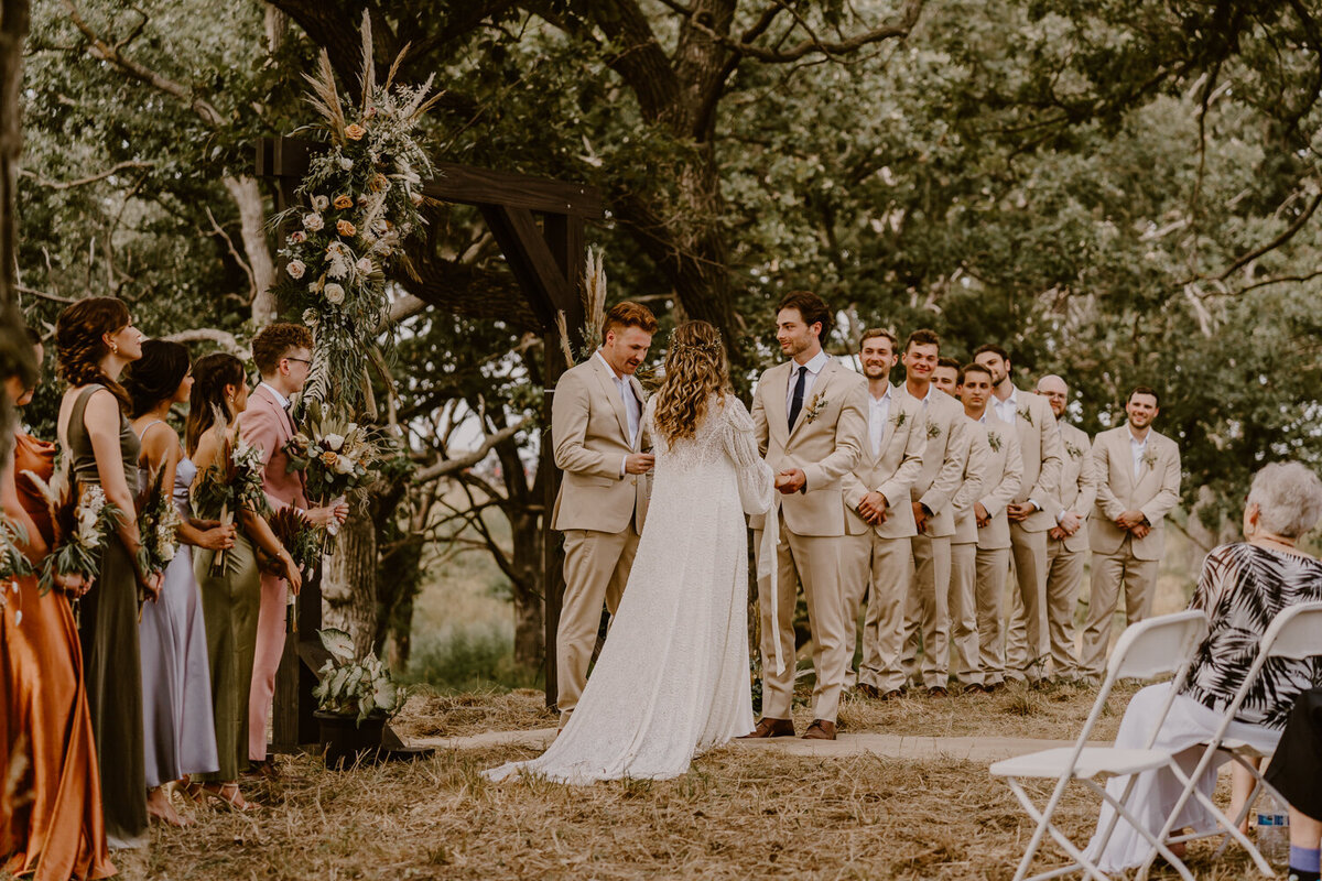 wedding-ceremony-vows-and-wedding-party-iowa-des-moines-wedding-photographer-storyteller-collective-photo-co