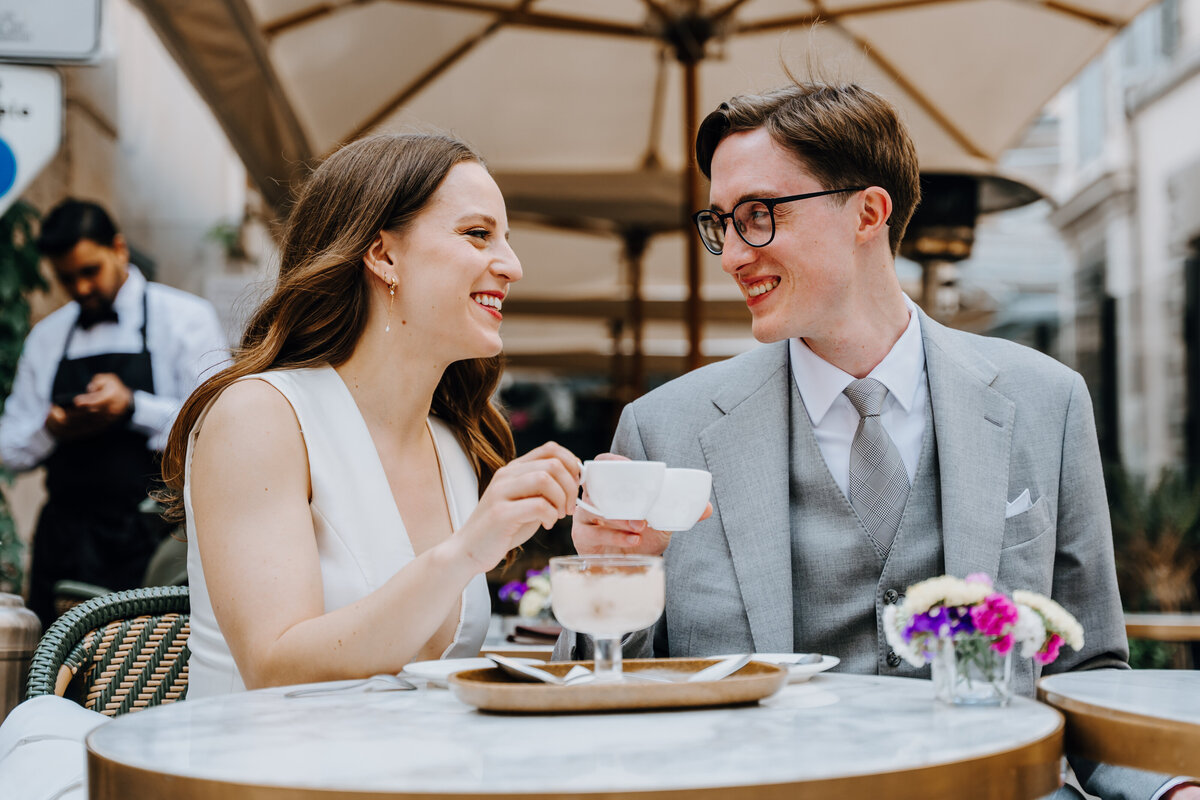 Intimate moment in a narrow Rome alleyway.