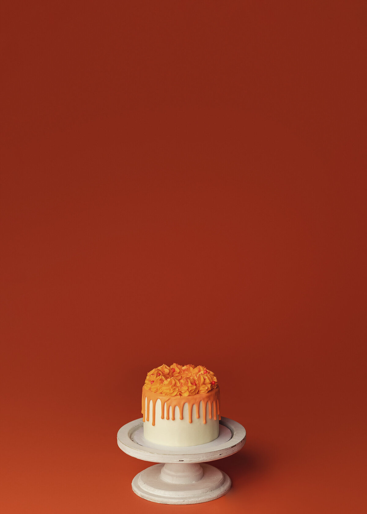 orange cake on orange backdrop