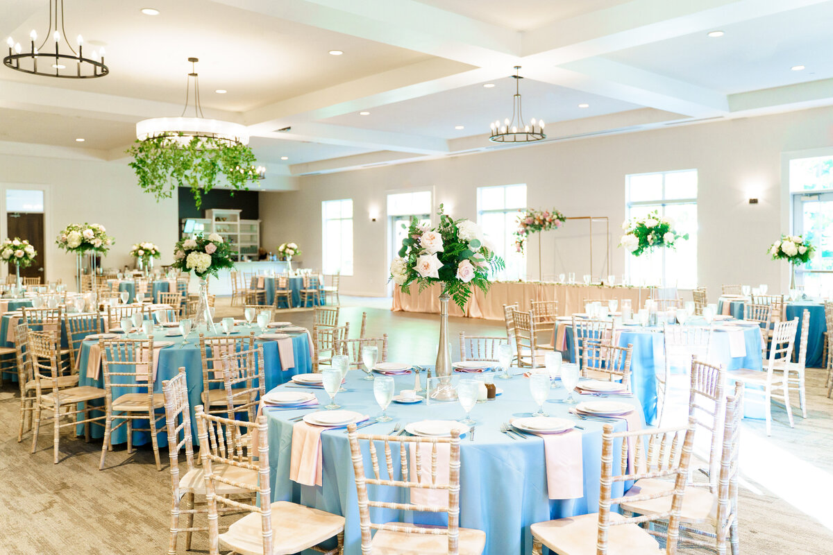 Reception space all decorated with florals and blue accents at The Estate at New Albany.