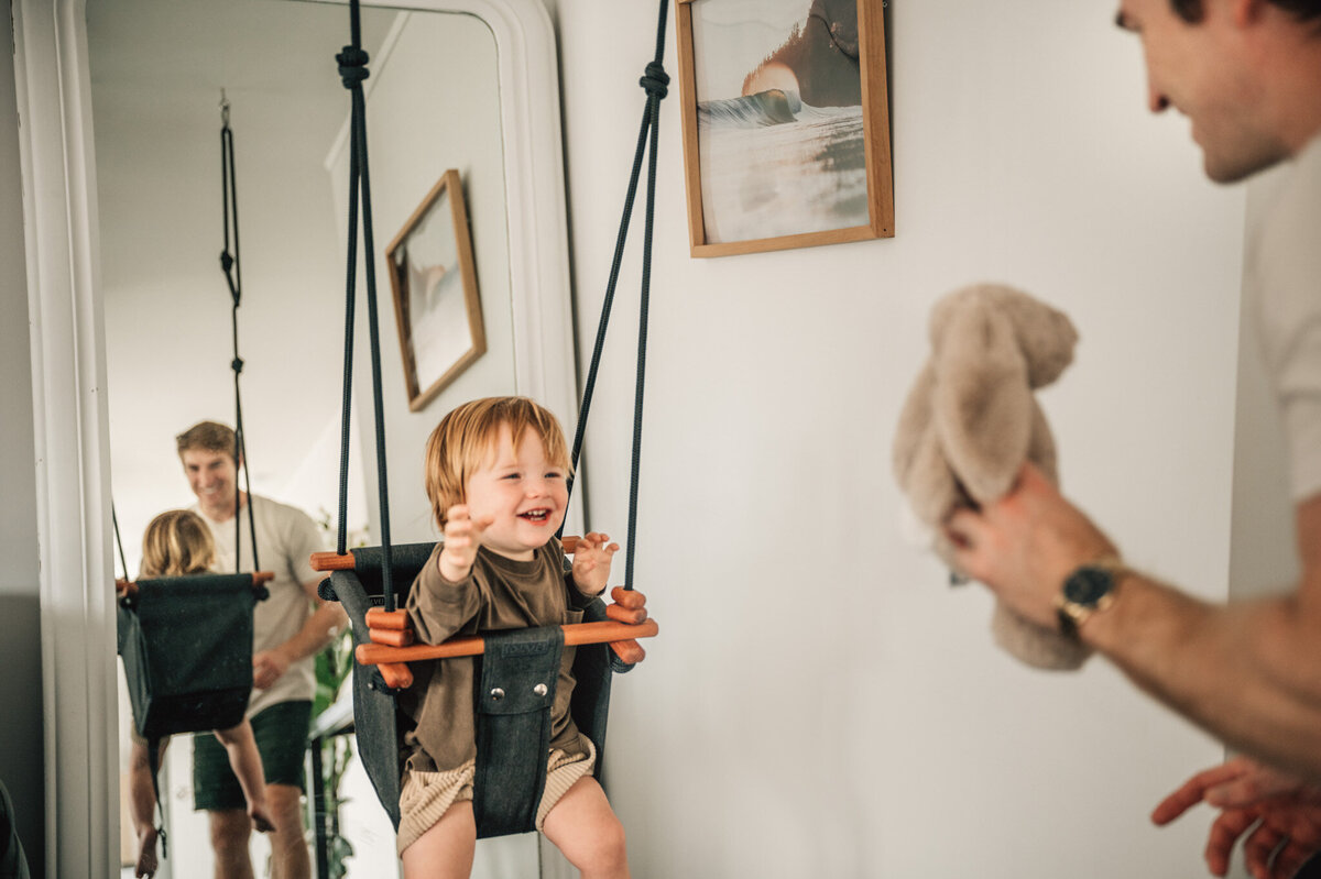 baby boy in a swing