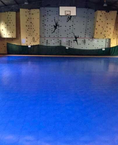 Indoor basketball sports court base painting before line marking