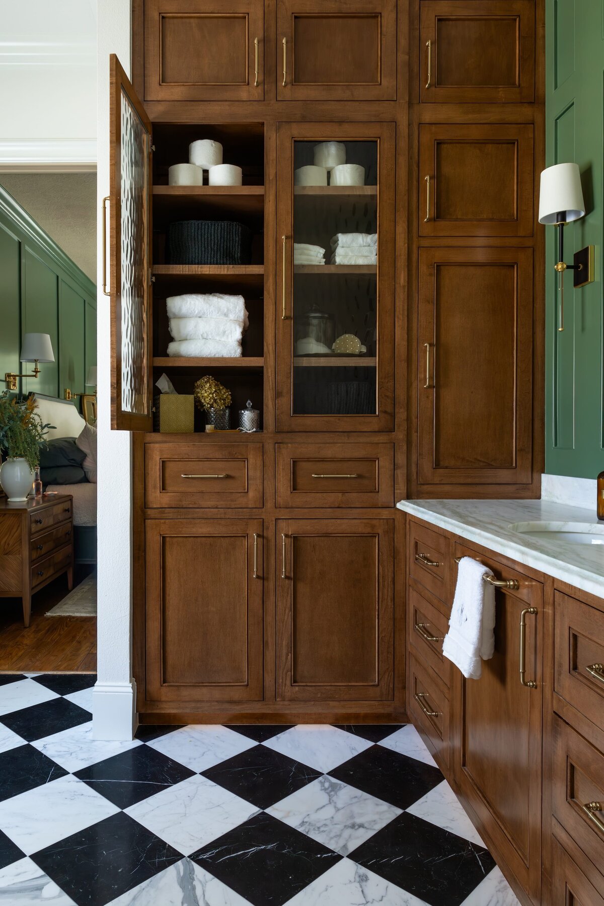 kyleen bushroe interiors coverdell black and white flooring with large buildin wood cabinets