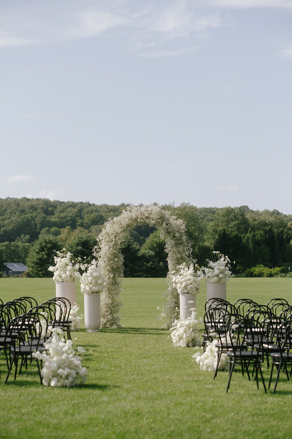 elegant-wedding-ceremony-white-floral-arch