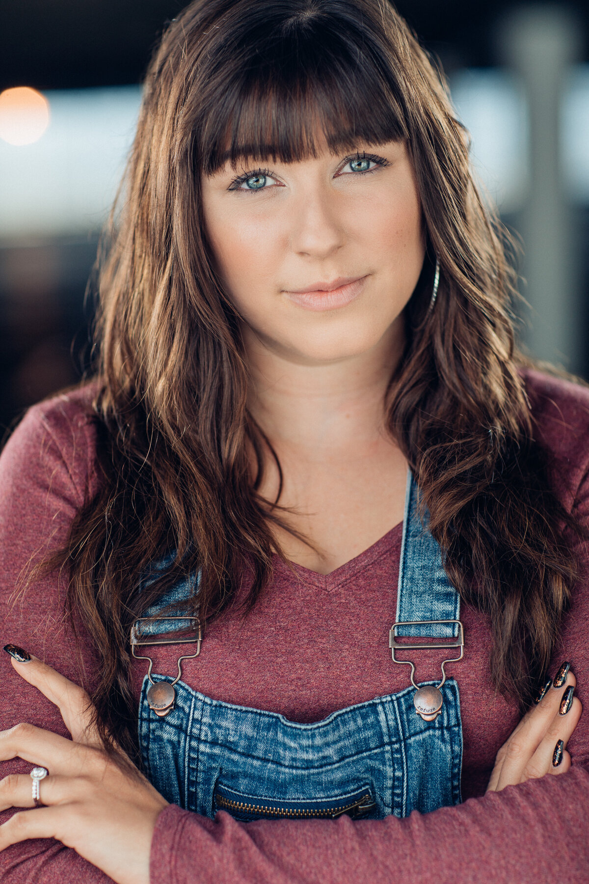 Headshot Photograph Of Young Woman In Denim Jumper And Maroon Sweater Los Angeles