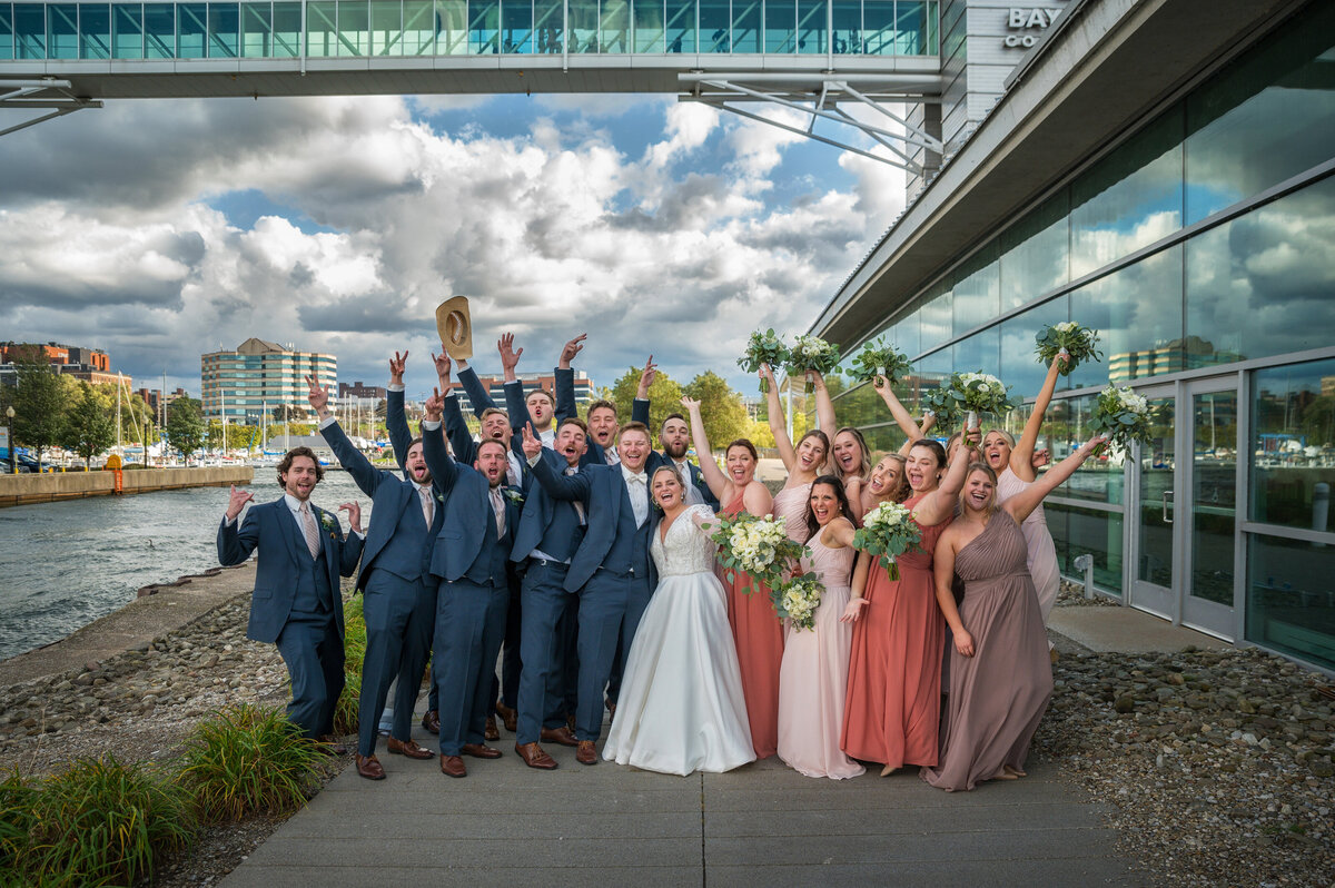 Bridal party cheering outside of Erie Bayfront Convention Center.