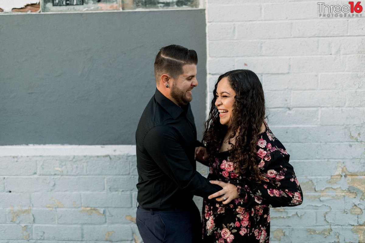 Bride to be is tickled by her fiance