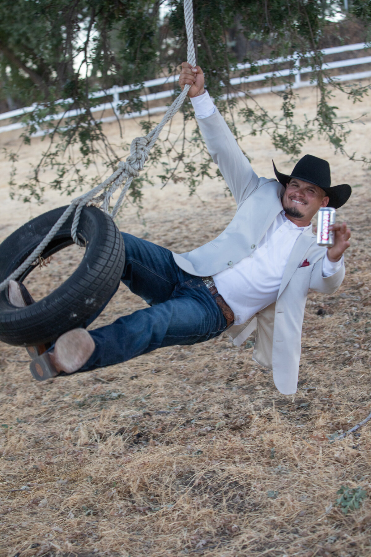 groom on tire swing