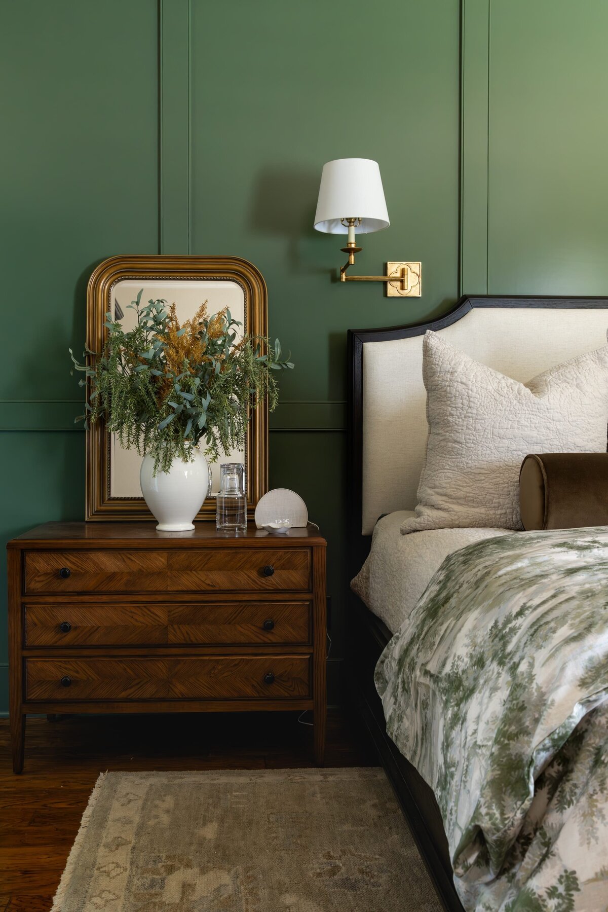 kyleen bushroe interiors coverdell master bedroom with dark wood side table and gold mirror