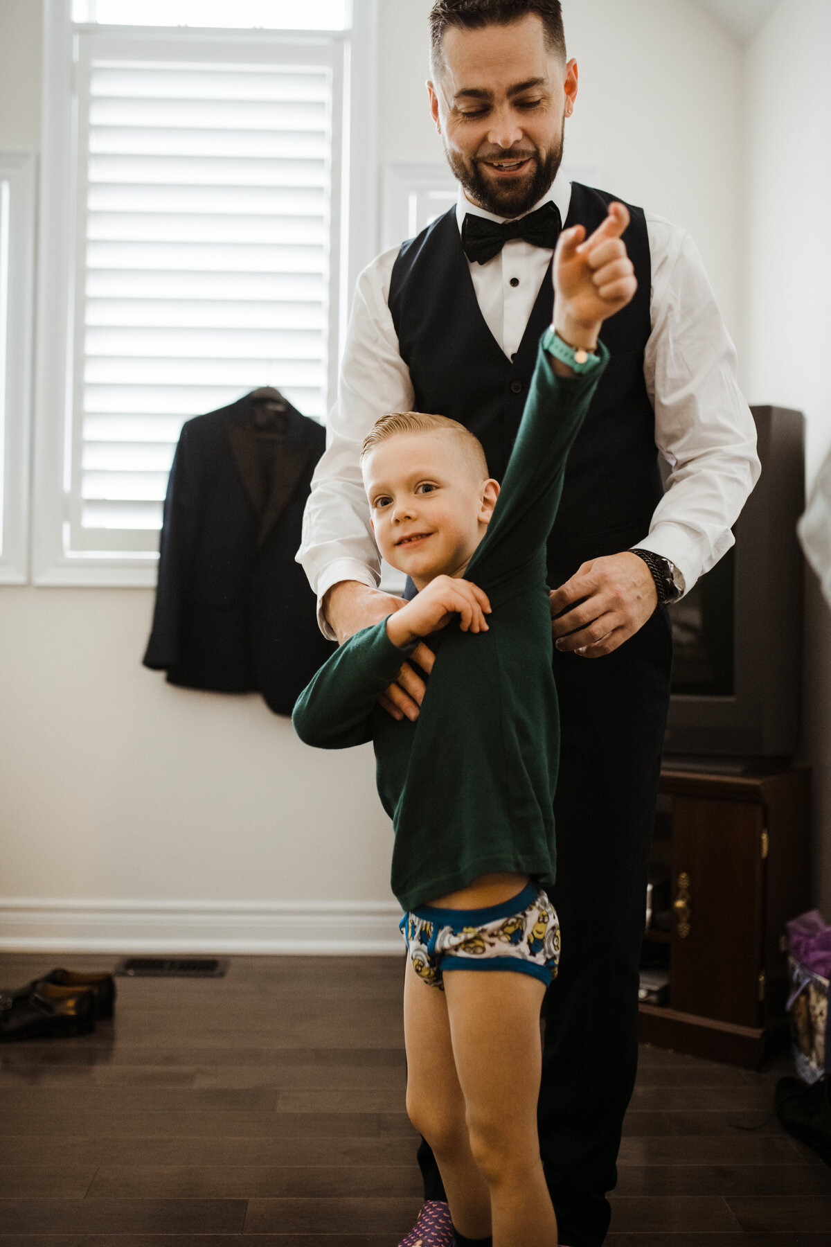 B-markham-home-covid-pandemic-diy-love-is-not-cancelled-wedding-photography-groom-son-getting-ready-20