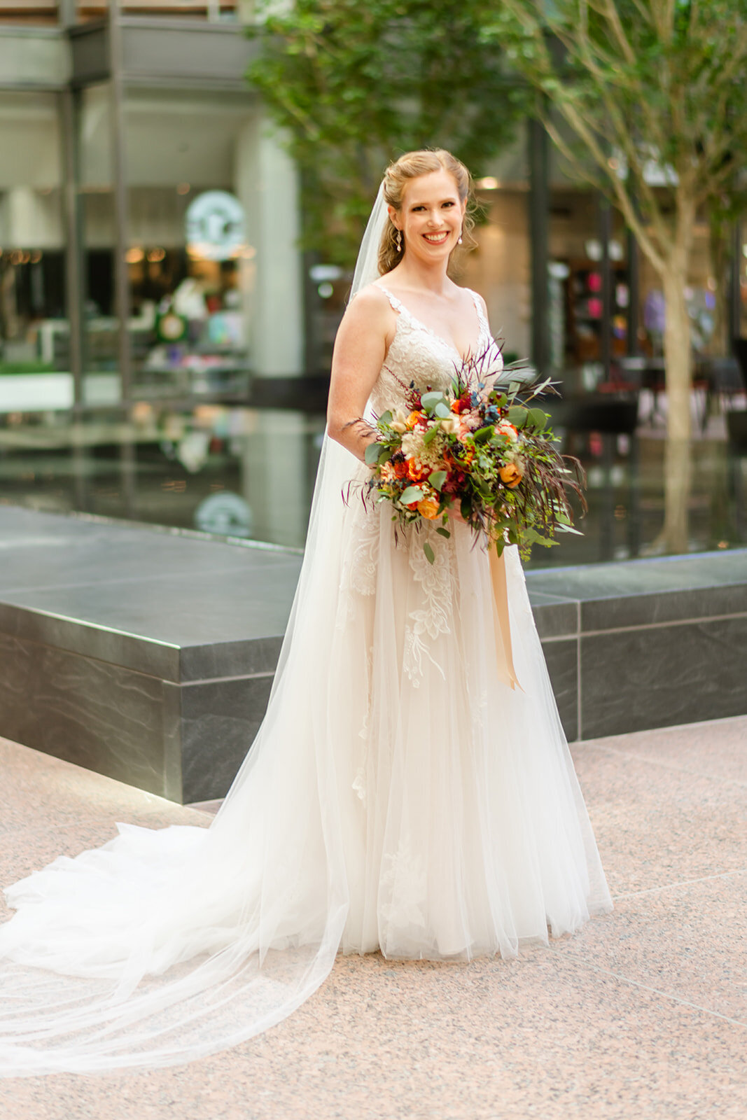 bride-full-length-portrait-bouquet-veil