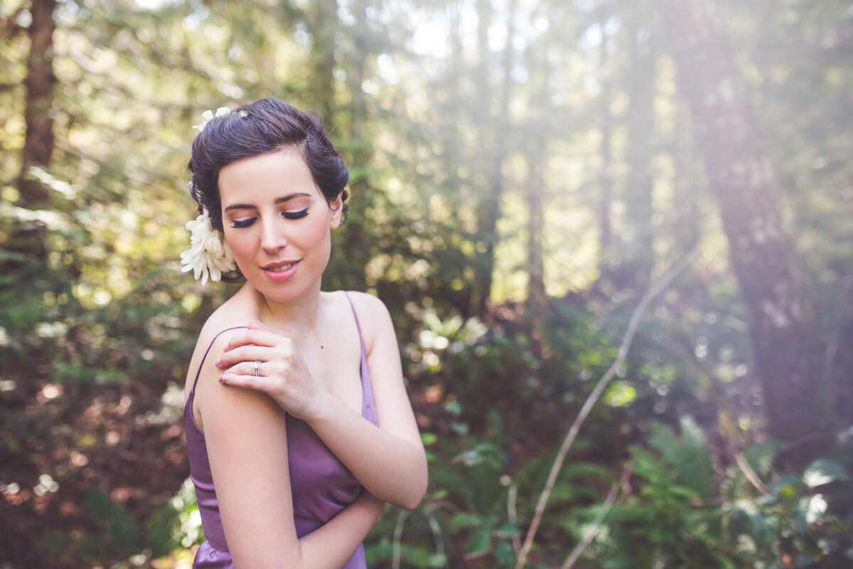 Brand portrait in Vancouver Island of a woman with flowers in her hair.