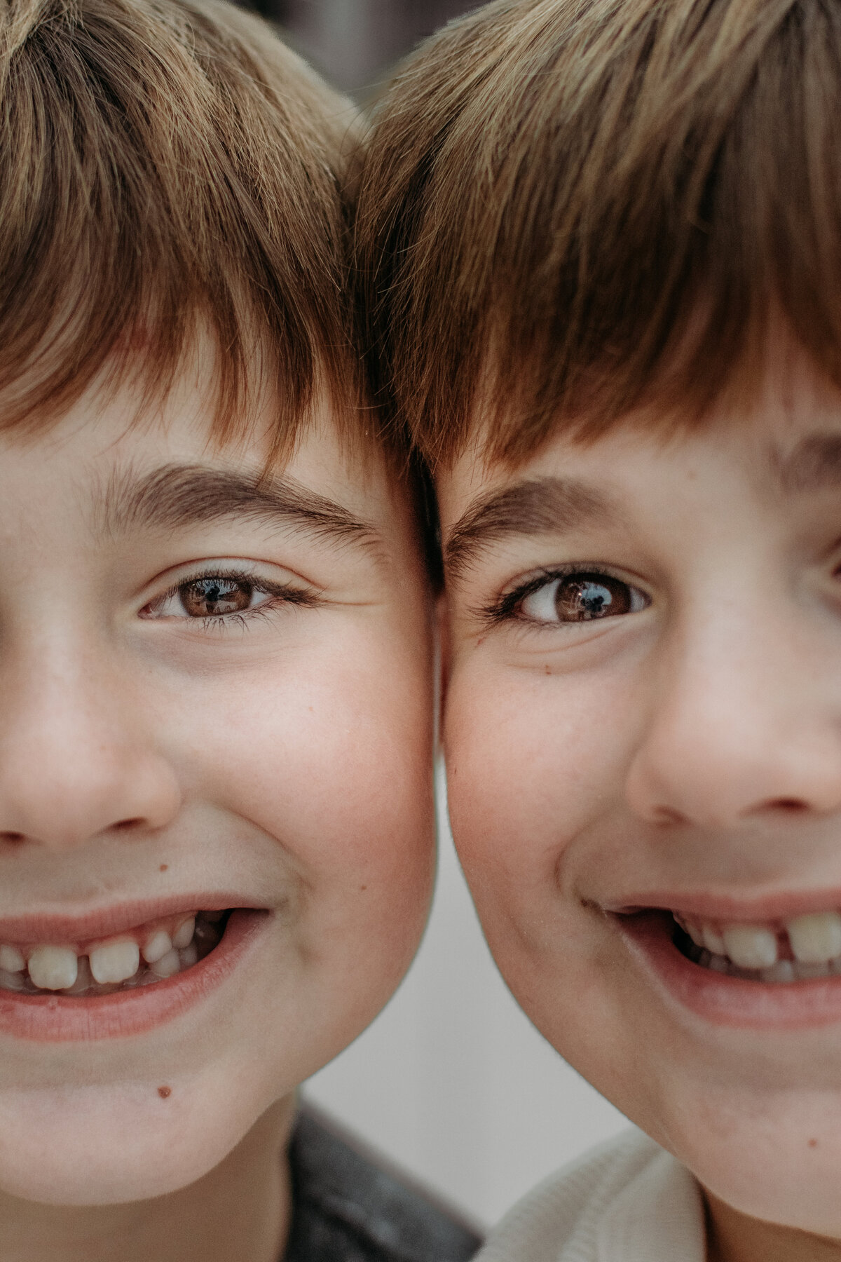 Twin brothers during a family photoshoot in St. Charles, IL