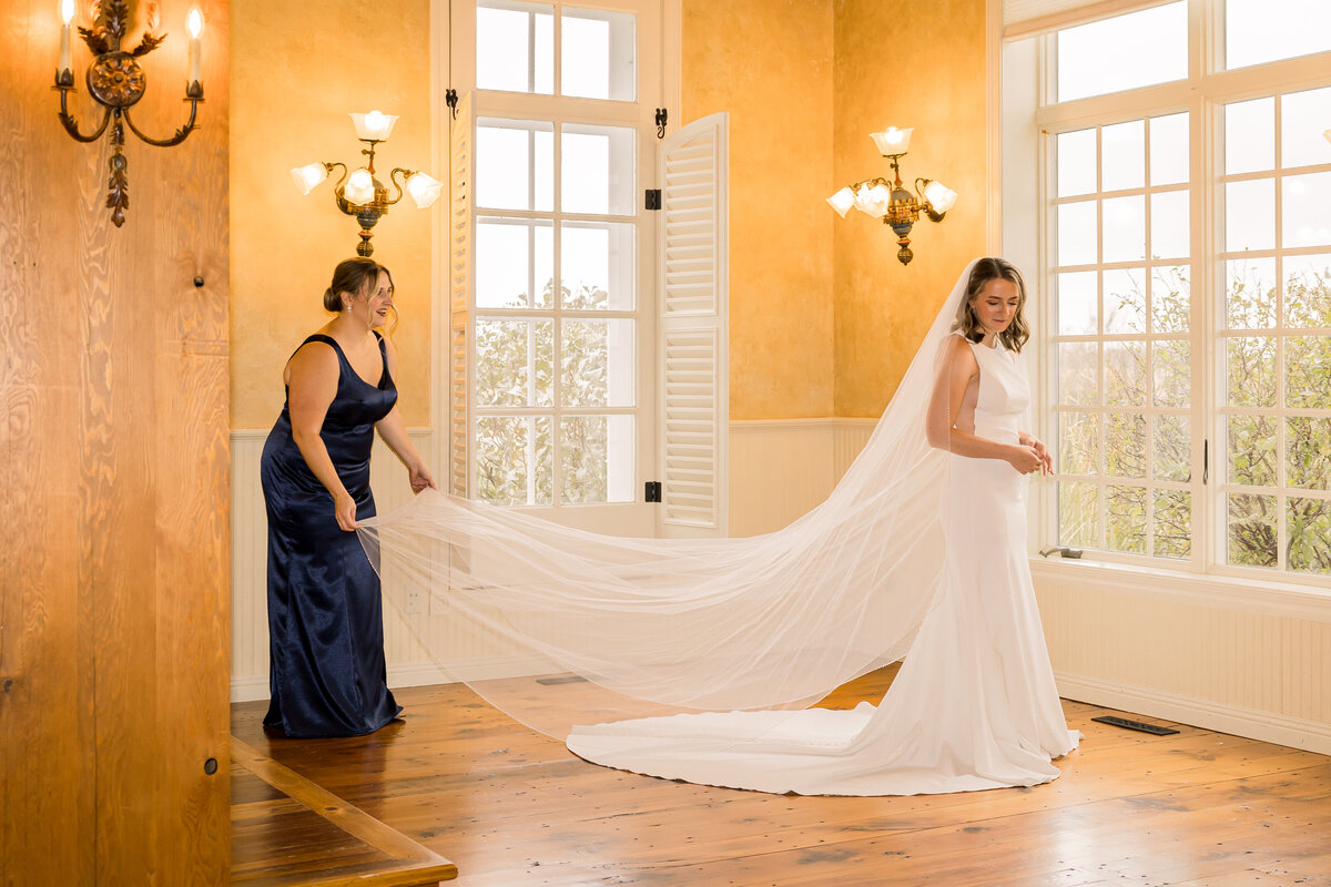 Bride getting ready on wedding day at Crooked Willow wedding venue